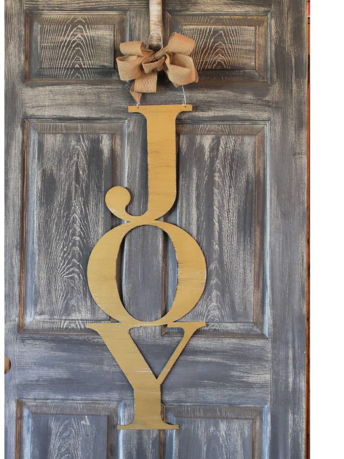 Joy Door Hanger for wholesale by Steel Southern Designs