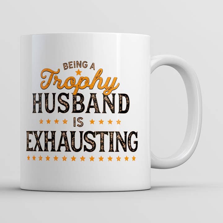 White Being A Trophy Husband Is Exhausting Mug sarcastic Graphic for wholesale on Faire0