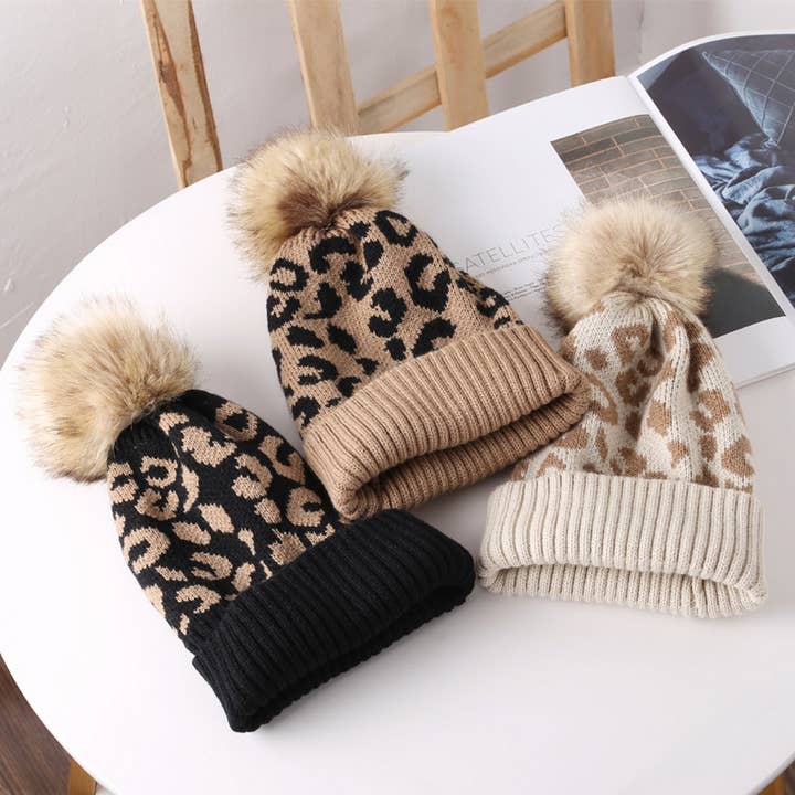 CASUAL WARM LEOPARD FUR BALL PATTERN KNITTED HAT_CWAH2174 and other Purchase Wholesale leopard beanie. Free Returns & Net 60 Terms on Faire trending on Faire.