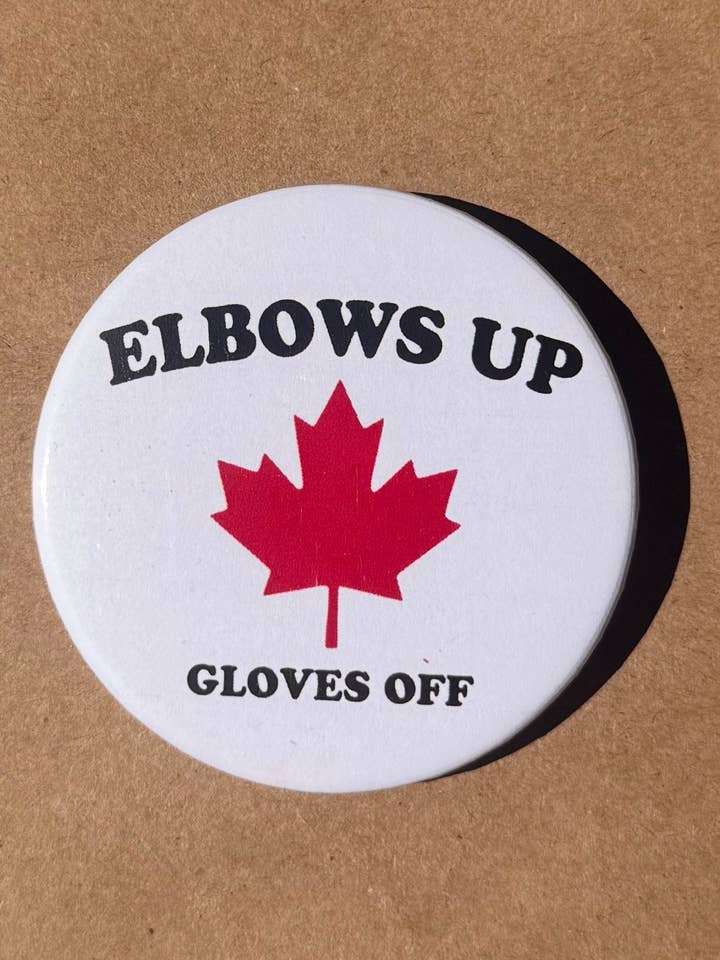 Coudes levés, gants retirés badge rétro à épingle thème Canada pour la vente par Just Chill Merch