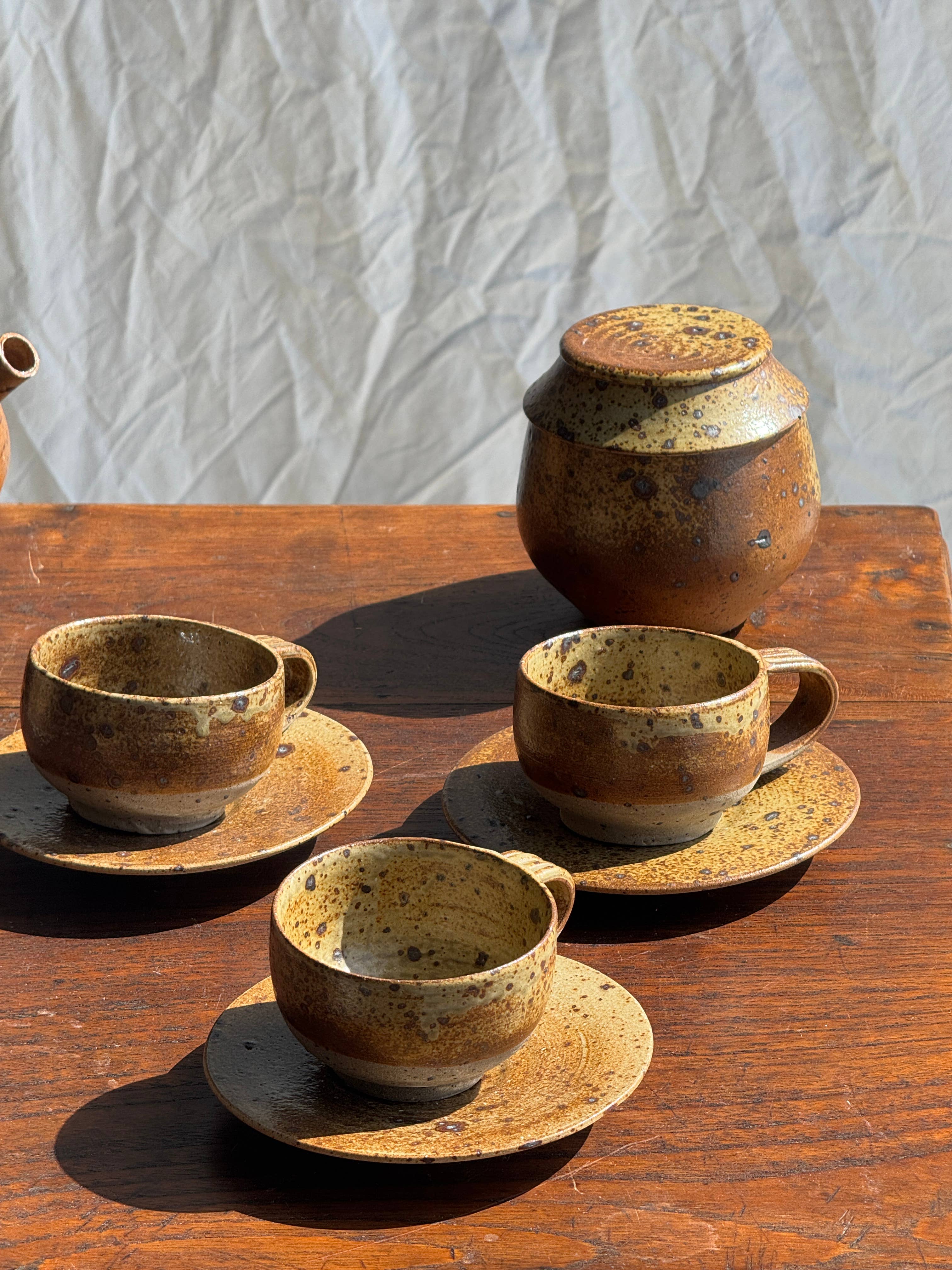 brown Small stoneware tea set with teapot, cups, sugar bowl for wholesale on Faire23