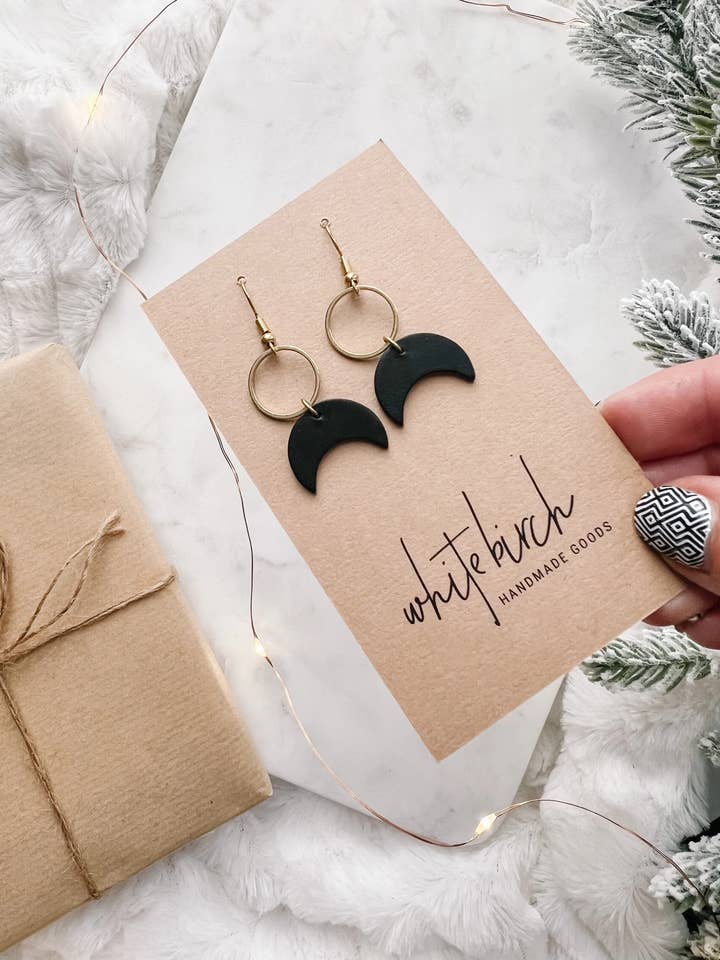 Black Leather Moon & Brass Ring Earrings for wholesale by Whitebirch Handmade Goods