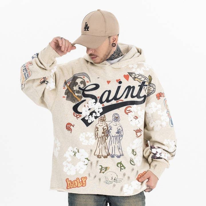 Sweat à capuche ample à motif gribouillage pour la vente par Sheer Trend