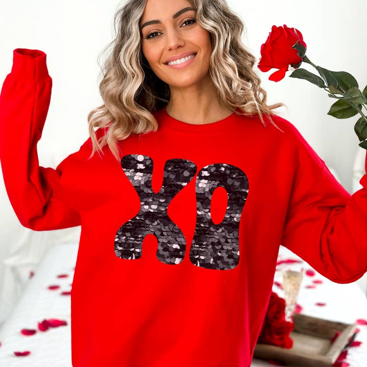 Stampa DTF XO per San Valentino con paillettes sintetiche per la vendita all'ingrosso da parte di Simple Tymes