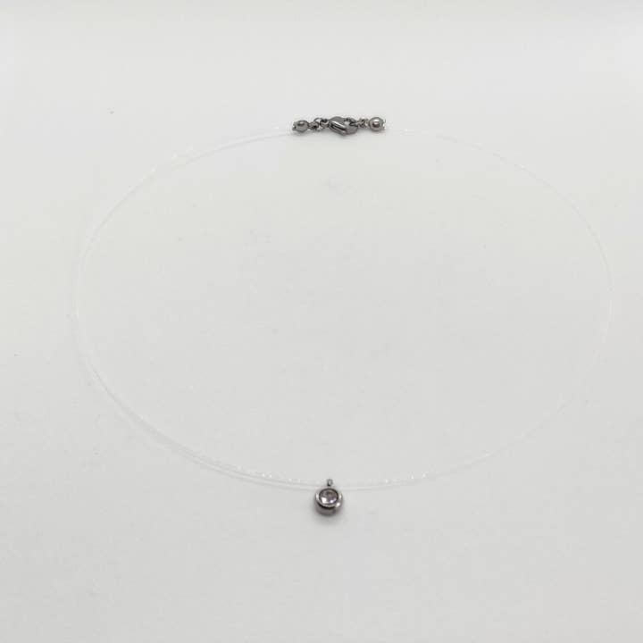 Collier fil nylon transparent pendentif zirconium acier inox pour la vente par Tendances perles