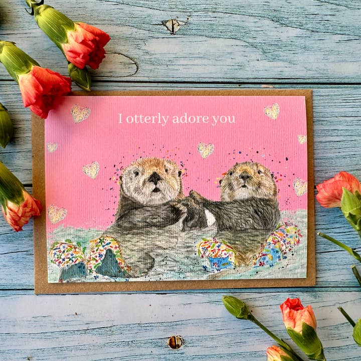 Otters houden van Valentijnsdag | Milieuvriendelijke kaart schattig kleurrijk voor wholesale door Jen Winnett Eco Artist