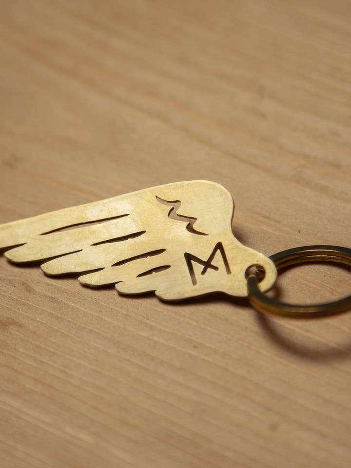 Porte-clés - Wing pour la vente par Maria Riding Company