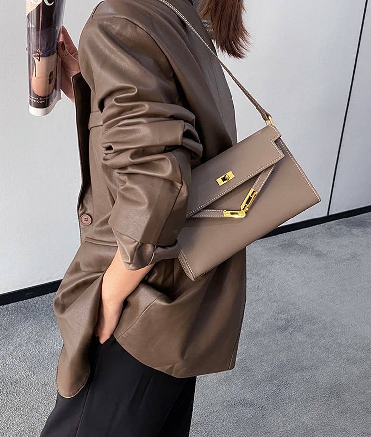 Sook Stainable - Vendita all'ingrosso Tracolla - Donna - Borsa a tracolla a busta in vera pelle con chiusura metallica15