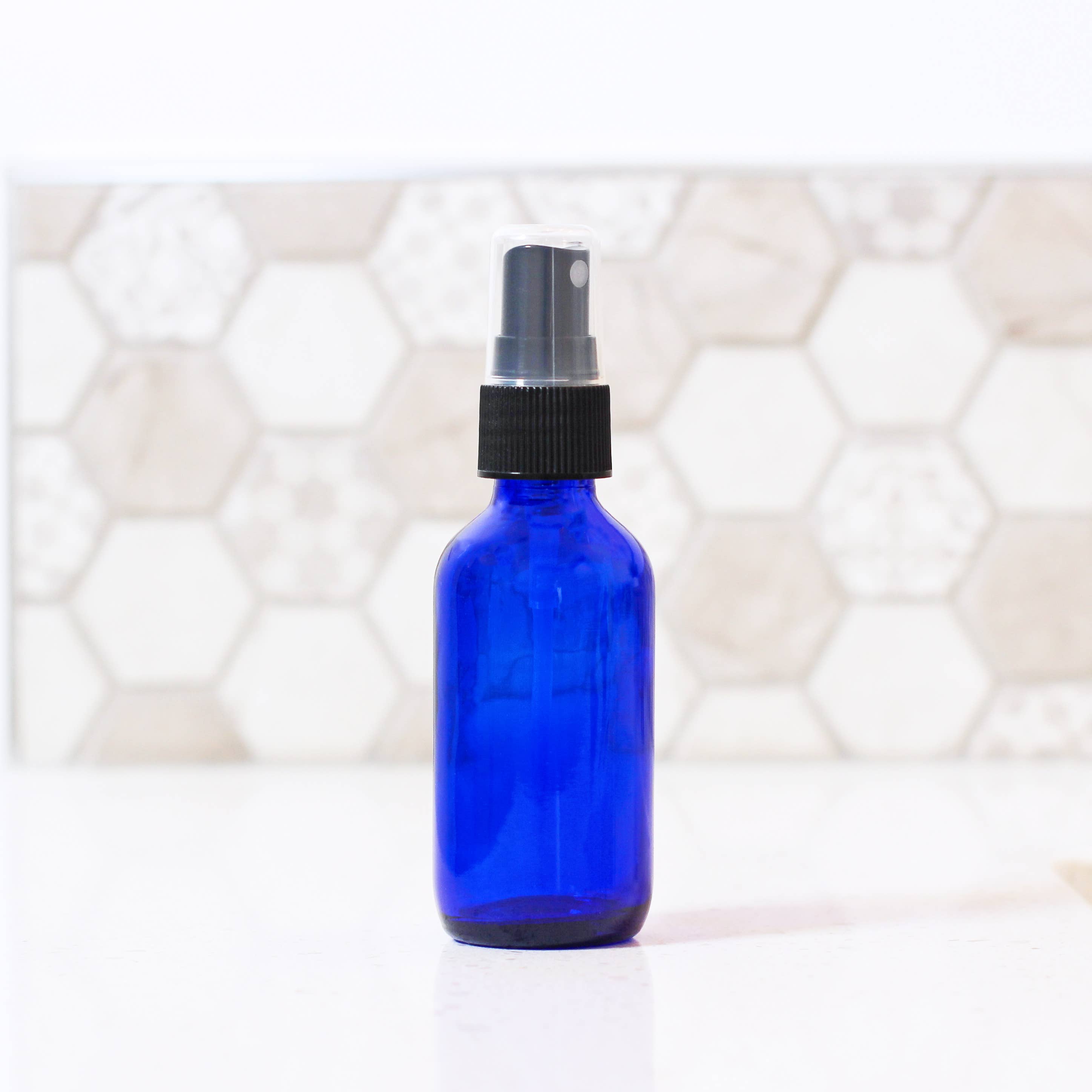 Matrix Aromatherapy - Wholesale Spray Bottle - 2oz Empty Blue Glass Spray Bottle1