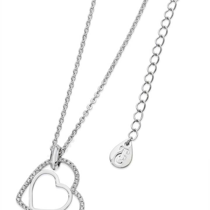 Silver Floating Heart Pendant for wholesale by James Trading Group INC