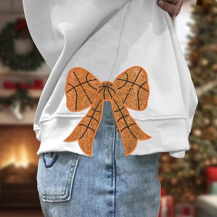 Christmas basketball Bow, Embroidered Side Bow Sweatshirt for wholesale by NVC Ecommerce LLC