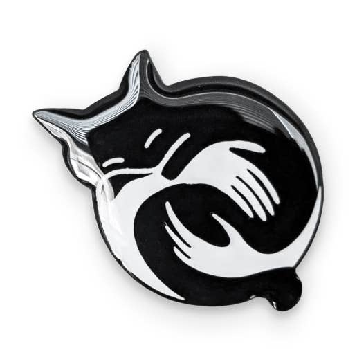 Black and White Cuddle Cat Enamel Pin for wholesale by Brandy Bingham