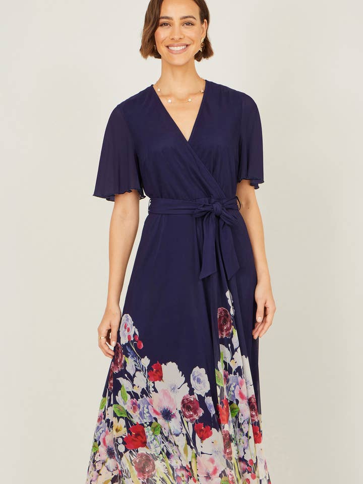 Yumi Navy Mesh Wrap Midi Dress With Floral Hem Border for wholesale by Yumi