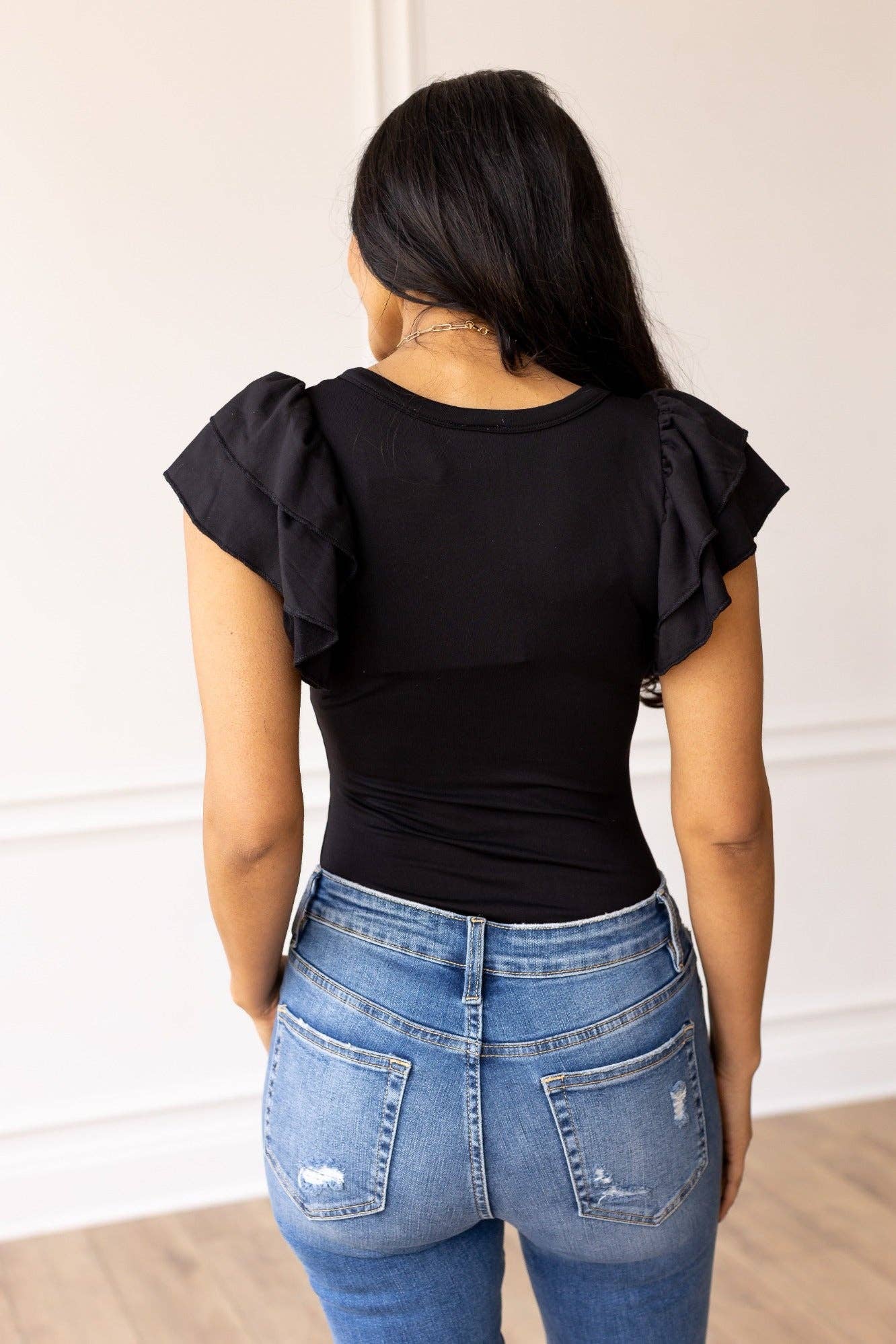 The Eloise Ruffle Sleeve Bodysuit, Black for wholesale on Faire2