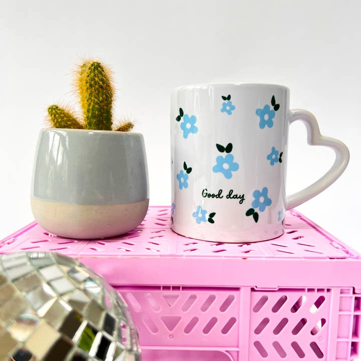 Blue good day mug for wholesale by Howrad Studios