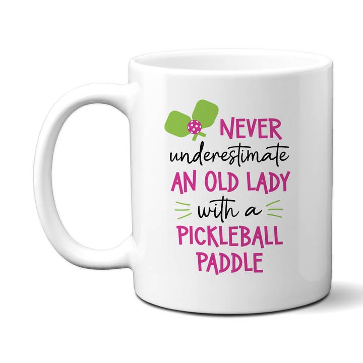 Never Underestimate Pickleball Mug, Funny Pink Coffee Cup for wholesale by Canary Road