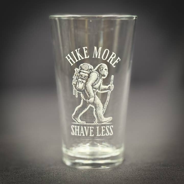 Bigfoot Hiking - Hike More Shave Less - Pint glass for wholesale by Adirondack Etching LLC