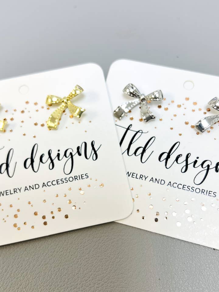 fiocchi in metallo per la vendita all'ingrosso da parte di TLD Designs