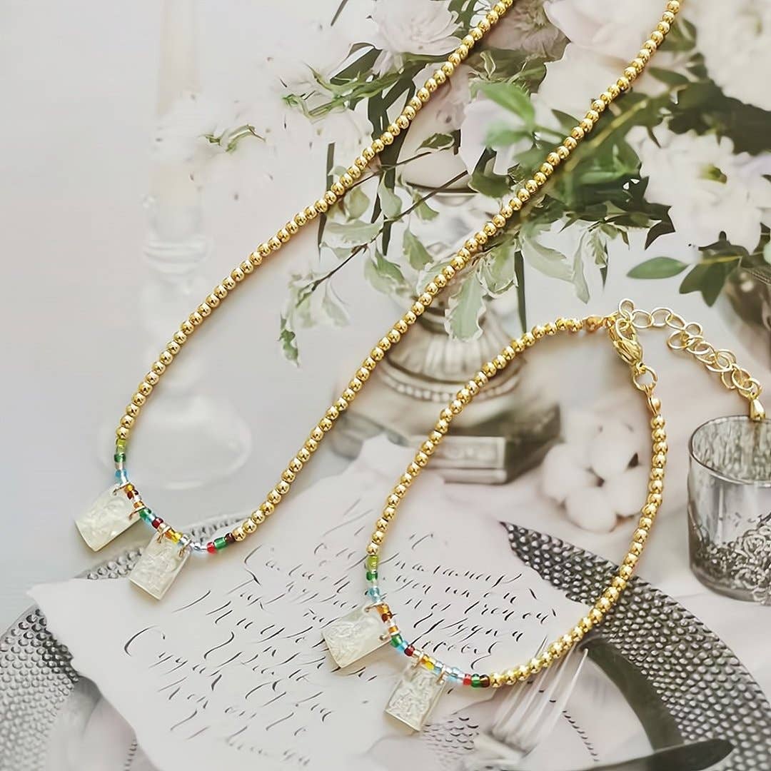 Guadalupe Gifts - Wholesale Sieradenset - Set van halsketting en armband van parelmoer met scapulier, 7-inch1