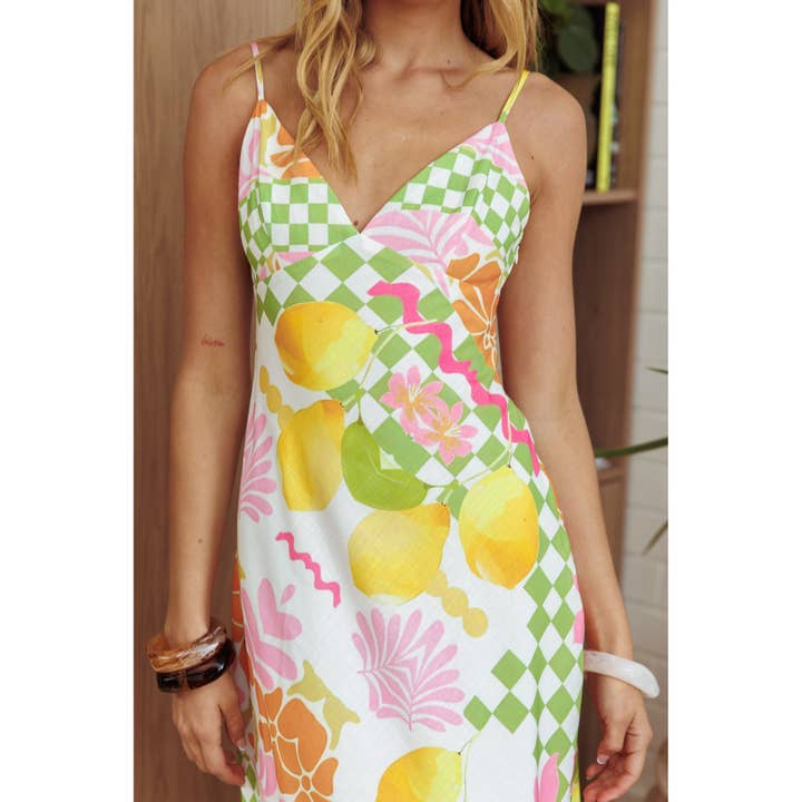 ORANGE VIBRANT FLORAL MAXI DRESS for wholesale on Faire