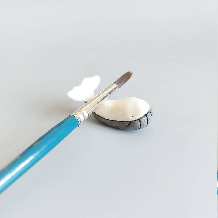 Muddy Ceramic Limited – Escova de tinta/cera por atacado – Porta-pincéis design de baleias, porta pincel cerâmico, pouso pincel, suporte de pincel branco, presente para artistas