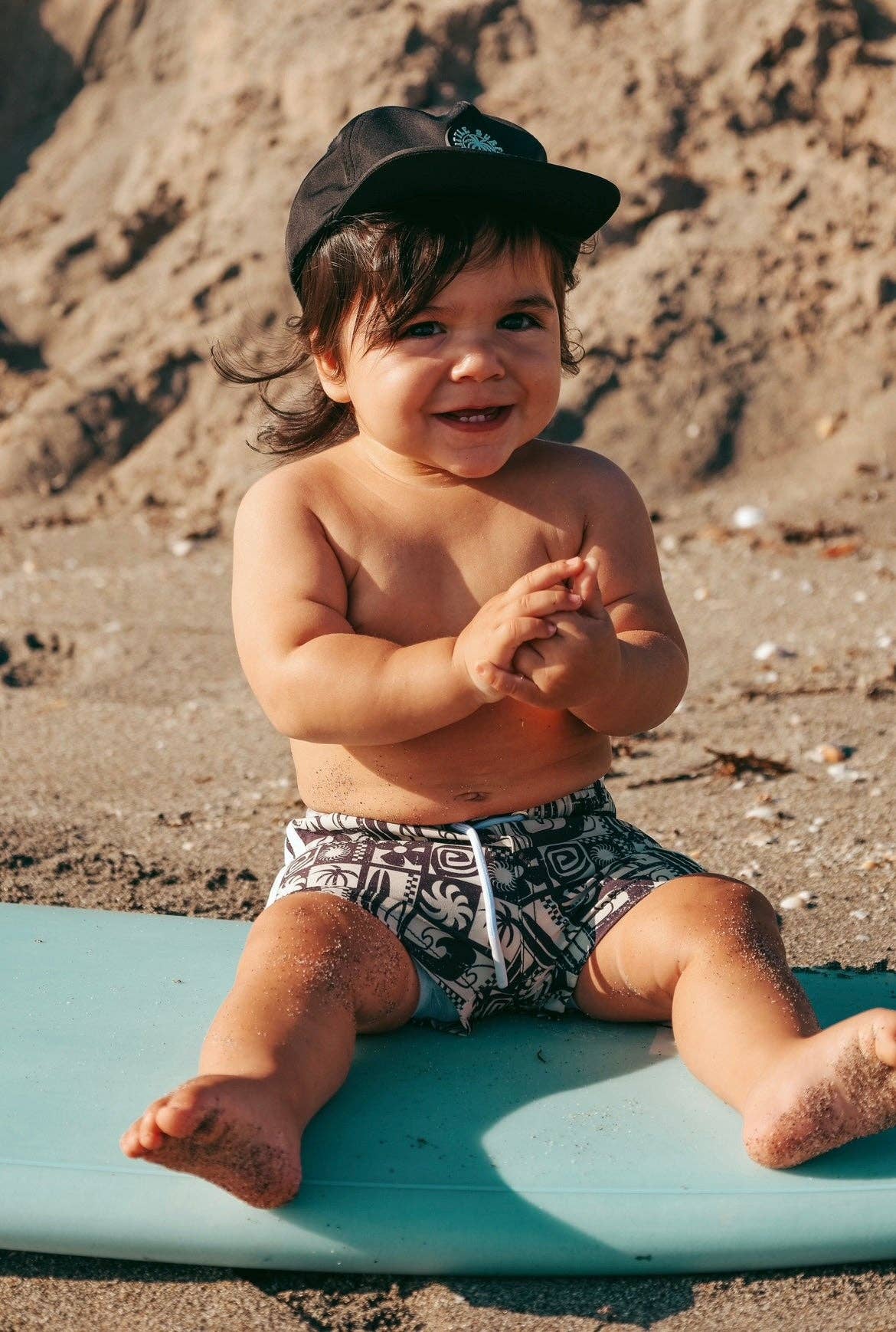 The Little Surfer Dude - Wholesale Swim Shorts - Kids - Vintage Black Swell Swim Trunks1