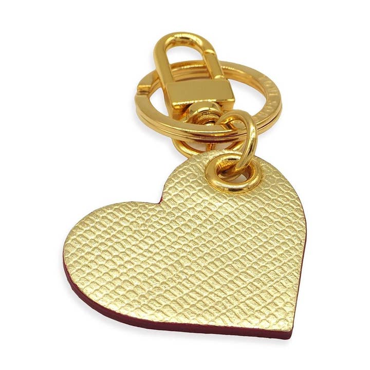 Gold Leather Lizard Embossed Heart Keychain / Bag Charm and other Purchase wholesale saffiano leather heart keyring. Free returns & net 60 terms on Faire trending on Faire.