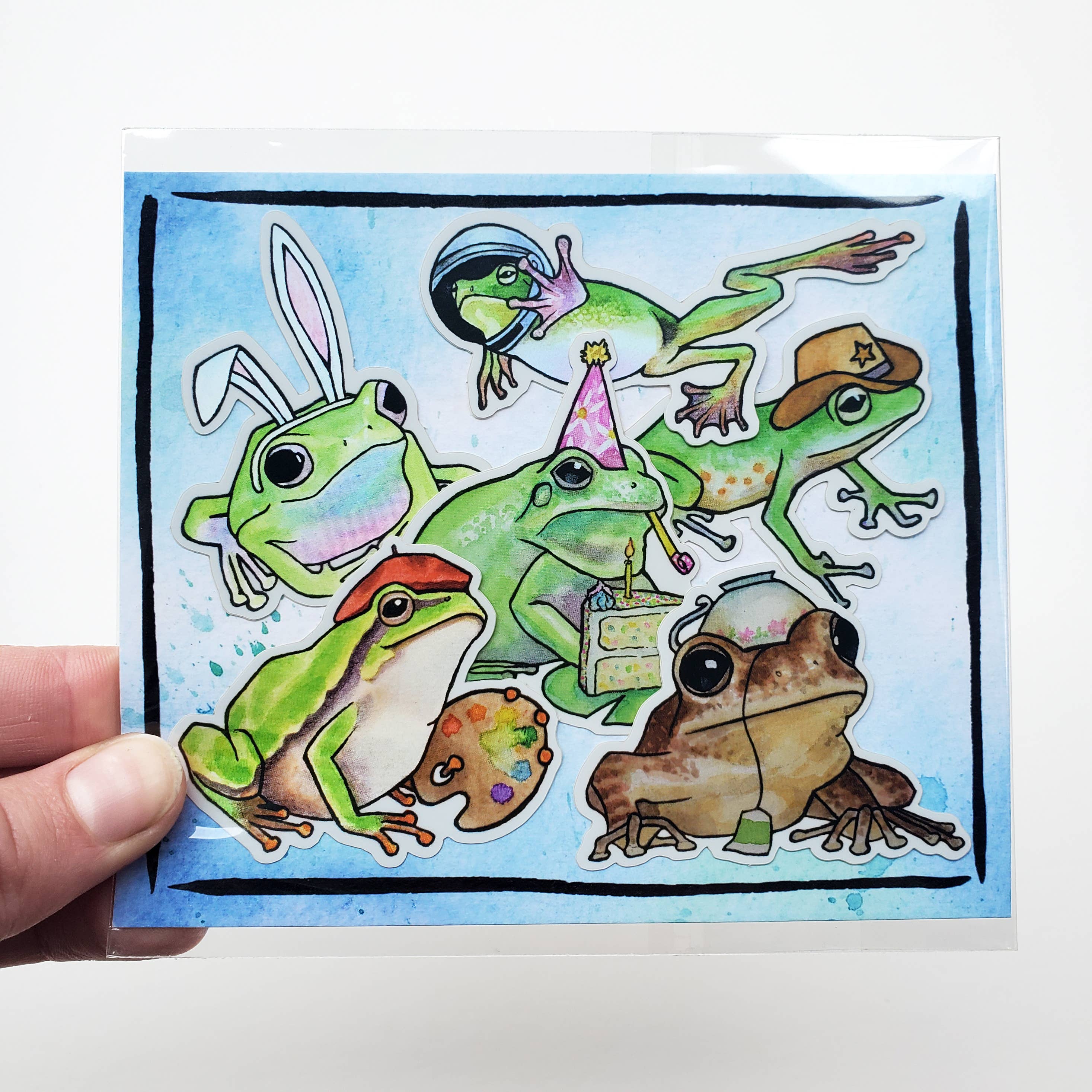 Art by Trisha Hall - Wholesale Sticker - Frogs with Hats | Sticker Pack