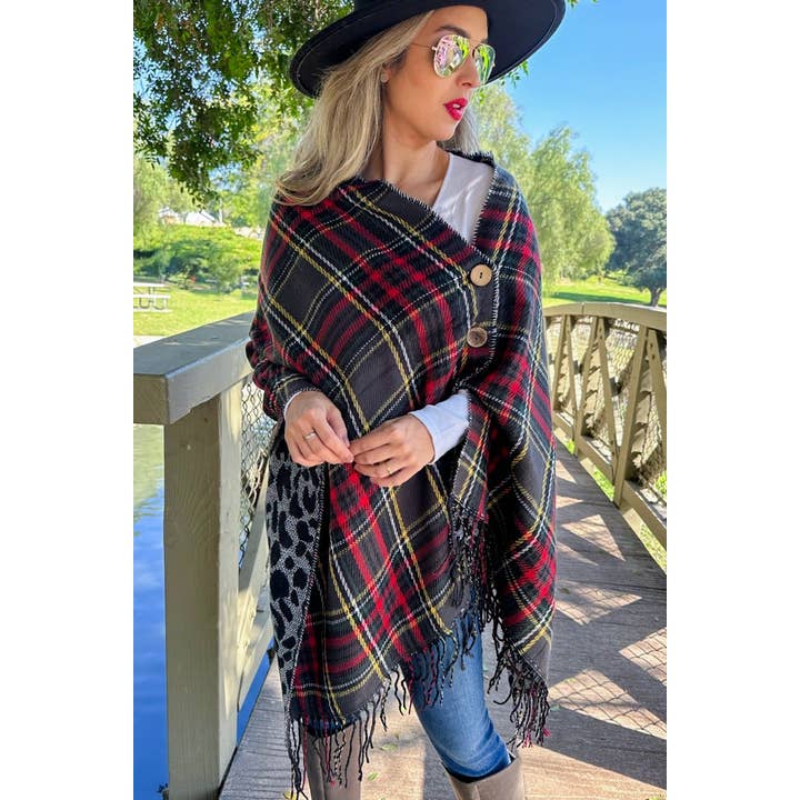 Black and Leopard Dual-Sided Reversible Poncho With Button and other Purchase Wholesale ponchos para mujer. Free Returns & Net 60 Terms on Faire trending on Faire.