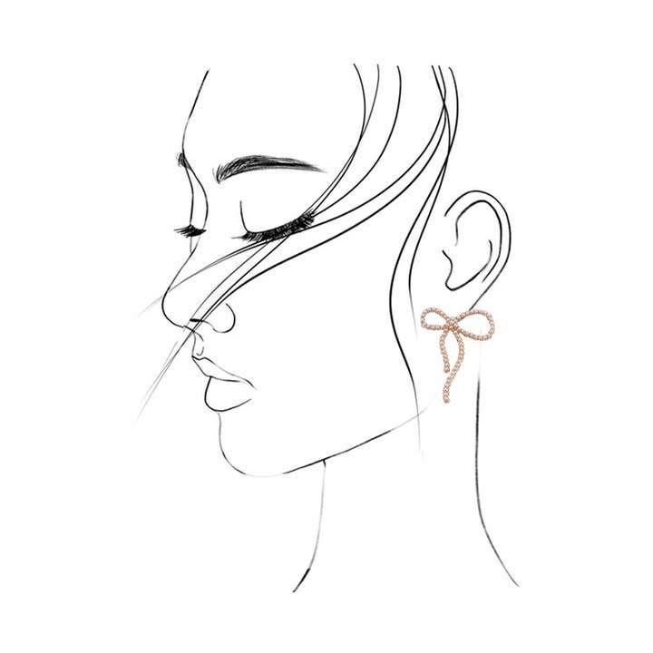 Gold BIG BOW PEARL STUD EARRINGS | 31E24163 for wholesale on Faire