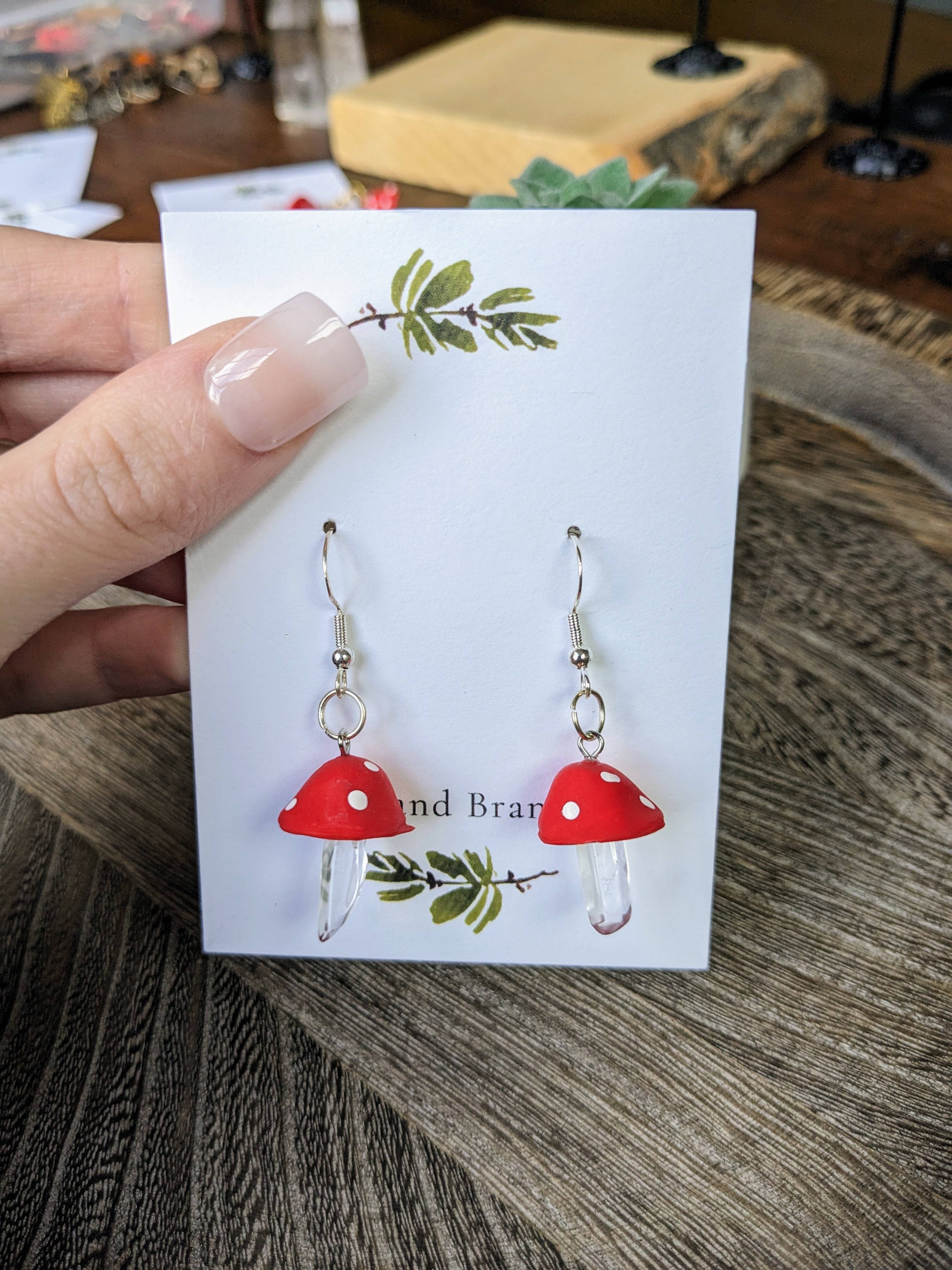 Stag and Branch - Wholesale Dangle Earrings - Crystal Red Top Mushroom | Clear Quartz Mushroom Dangle Hand1