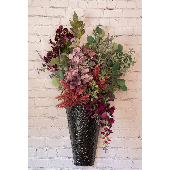 Purple Flowers In Sconce Arrangement for wholesale by Cozy Arrangements