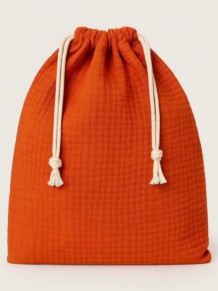 Personaliseerbaar baby- en kindzakje in tangerine katoenen gaze voor wholesale door MAZZANNE