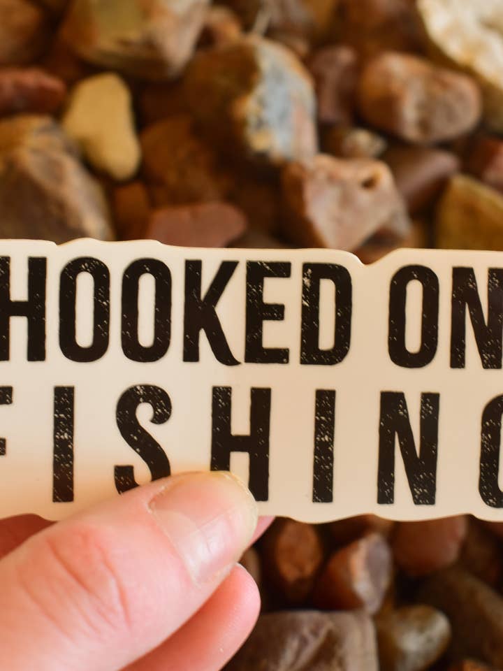 Hooked on Fishing Waterproof sticker for wholesale by Little Rocks Design