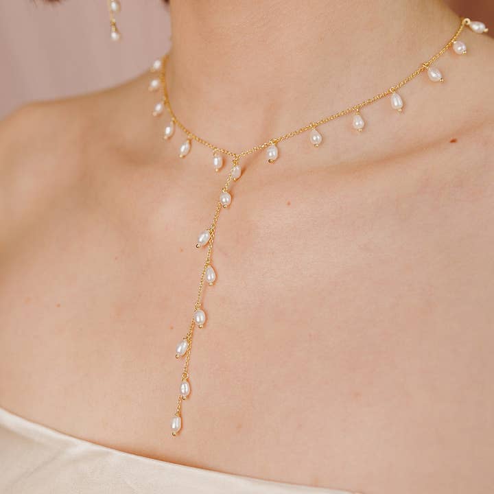 Whispering Pearl Lariat Necklace for wholesale by Wander + Lust Jewelry