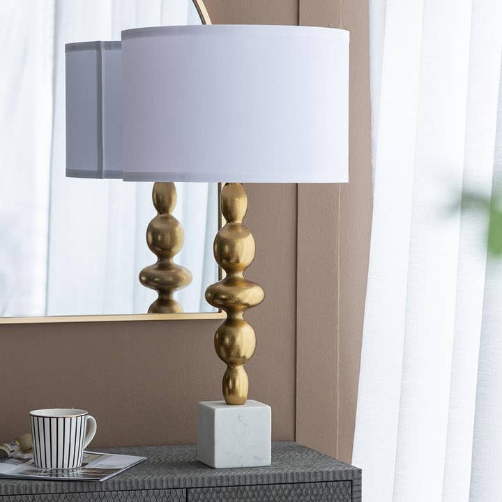 D15x29.5" Gold/White Table Lamp with Round 4-Tiered Body and other Purchase Wholesale cordless table lamp. Free Returns & Net 60 Terms on Faire trending on Faire.