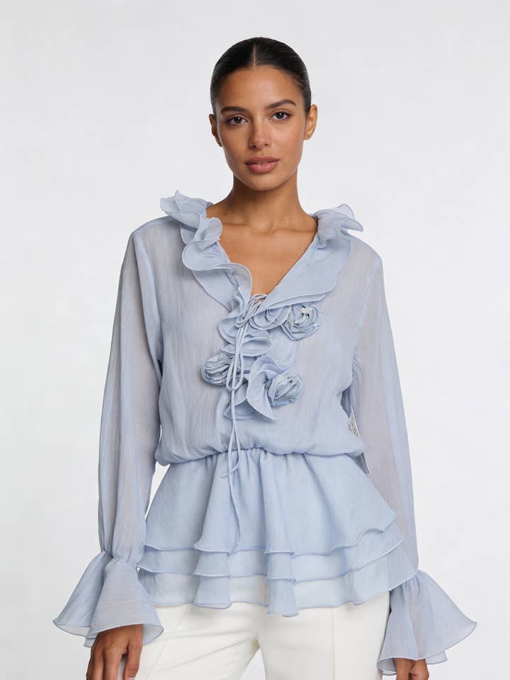 Blouse à volants à étages avec rosettes et basque pour la vente par LINZY