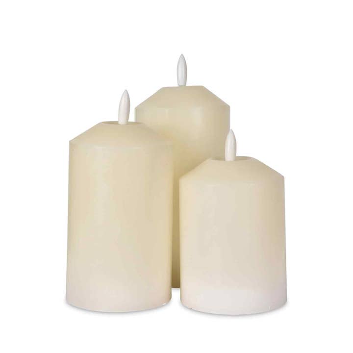 Set of 3 ivory natural wax LED candles with remote control (battery operated) for wholesale on Faire