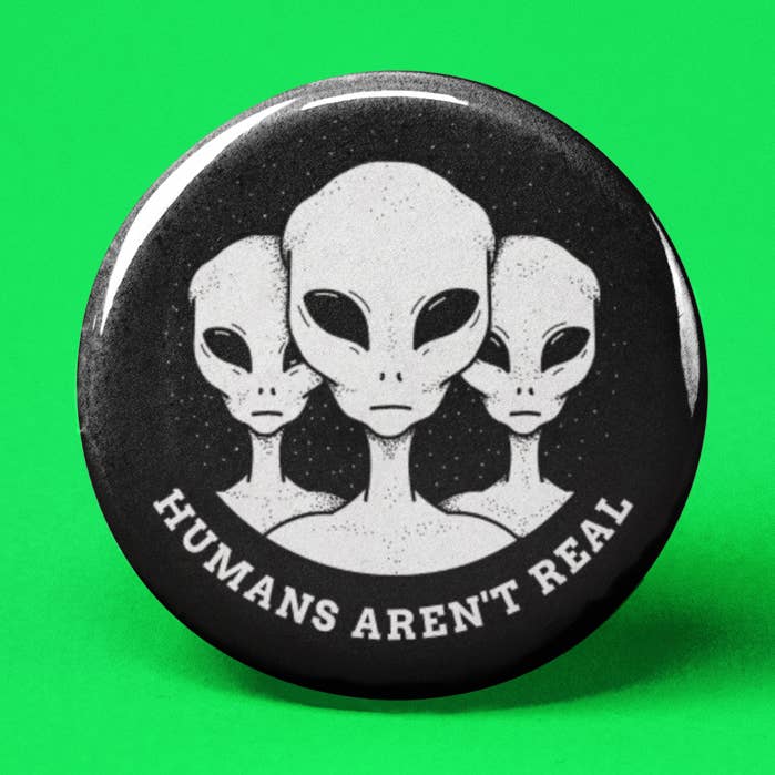 Humans Aren't Real Pinback Button for wholesale by The Pin Pal Club