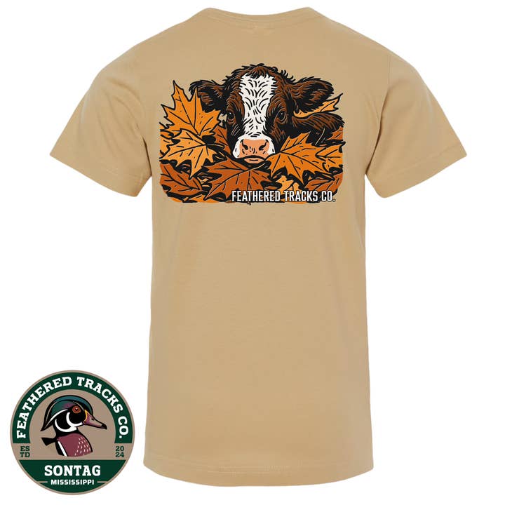 Cow Laying in Leaves for wholesale by Feathered Tracks Co.