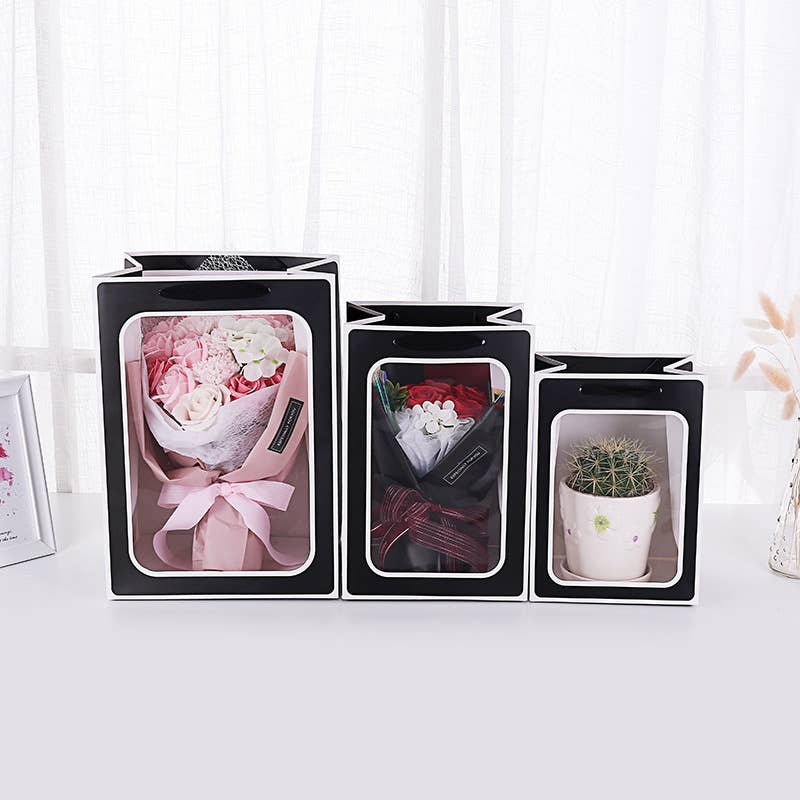 ByHome – wholesale Presentpåse – Svart papperspåse med vit kant och transparent fönster4