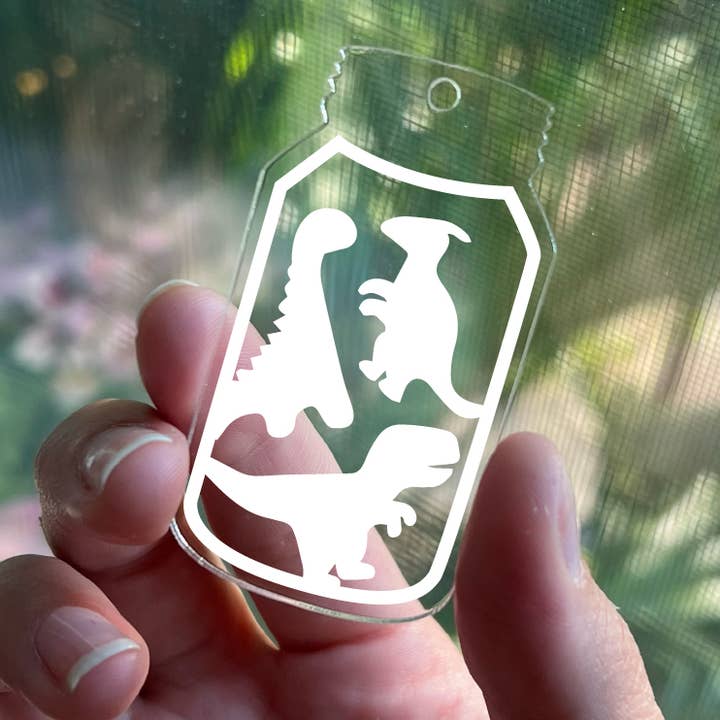 White Dinosaur Clear Acrylic Keychain Jar Shaped for wholesale by Triangular Studio Inc
