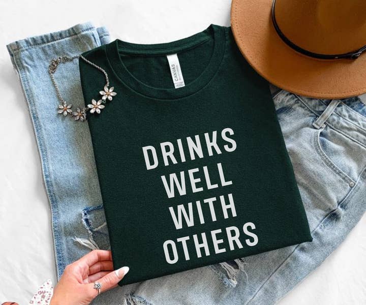 Drinks Well With Others Graphic Tee for wholesale by Stiles Tee Co.