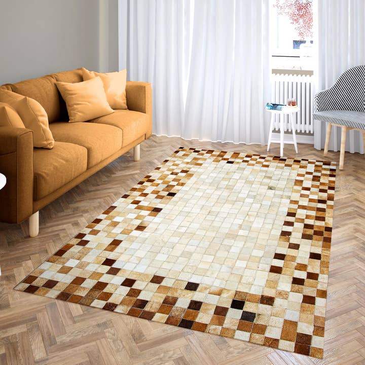 Light Brown Chekered Border & Beige Cowhide Patchwork Rug for wholesale by Karelias And Sons