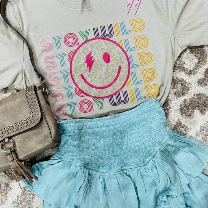 Visage souriant Restez sauvage pour la vente par Threads Wholesale