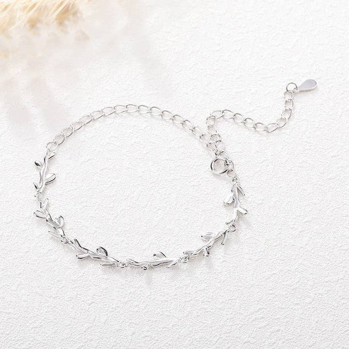 Olive Tree Leaf Branch Charm Bracelet in 925 Sterling Silver for wholesale by Perimade & Co. LLC