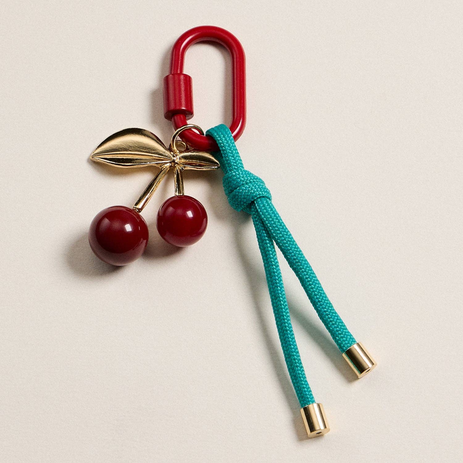 MT Enamel Cherry Charm Keychain with Rope Accent for wholesale on Faire0