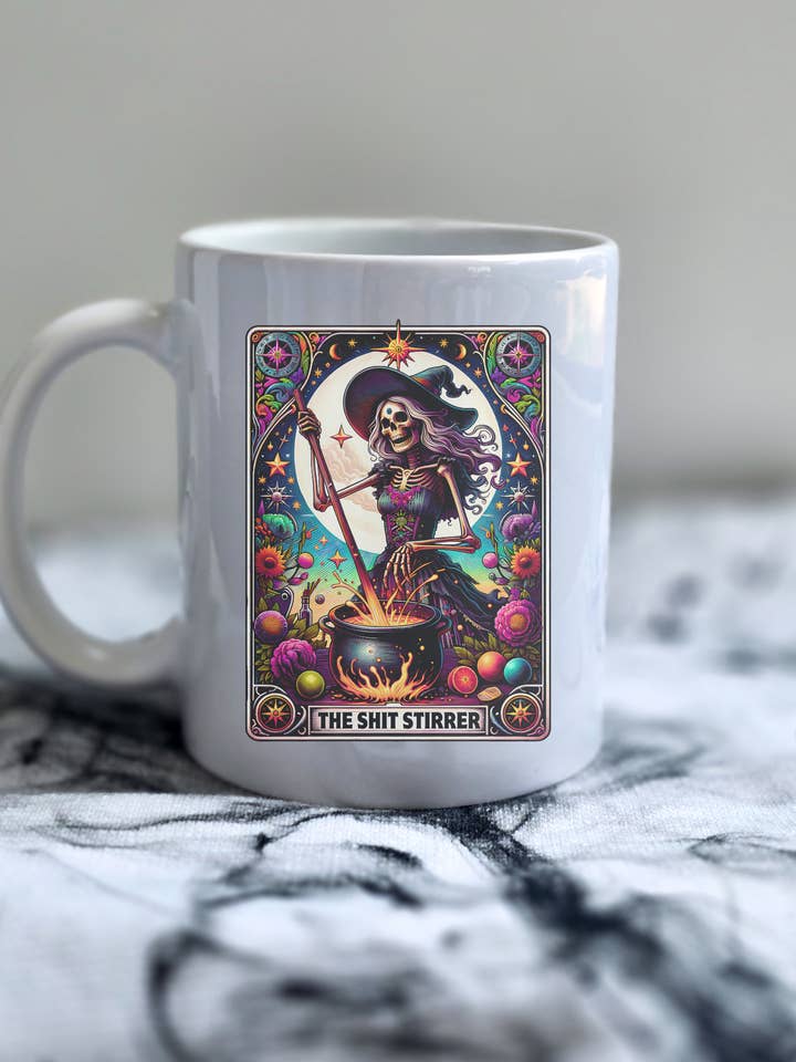 The Shit Stirrer Tarot Card Mug for wholesale by Galactic Sapphire