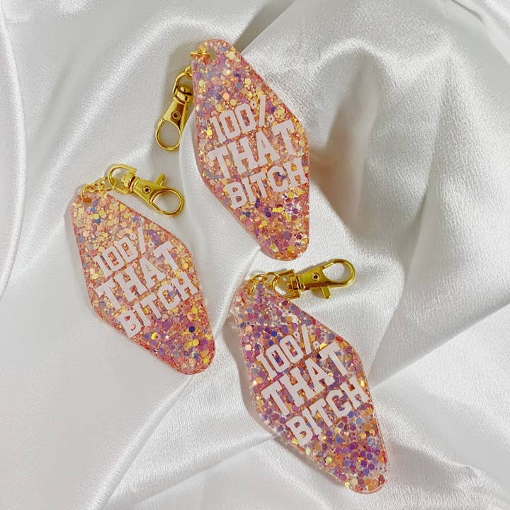 100% That Bitch - Hotel Key Tag Resin Keychain for wholesale by Nony Design Company