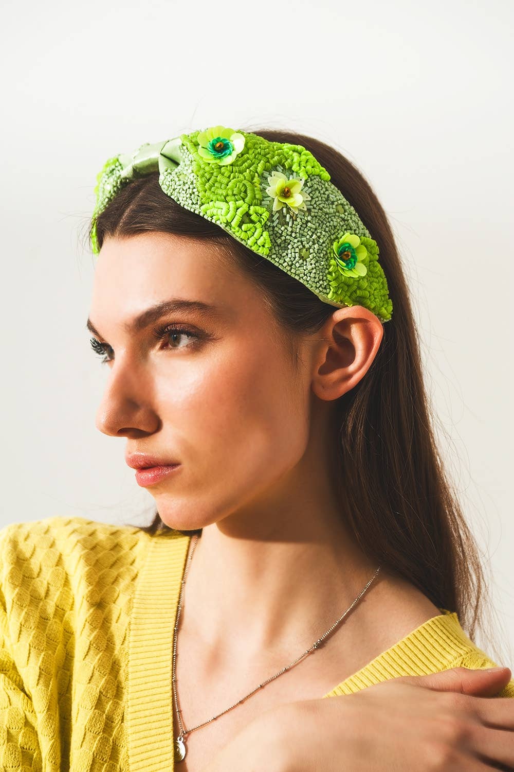 Chunky headband with embellished green flowers for wholesale on Faire